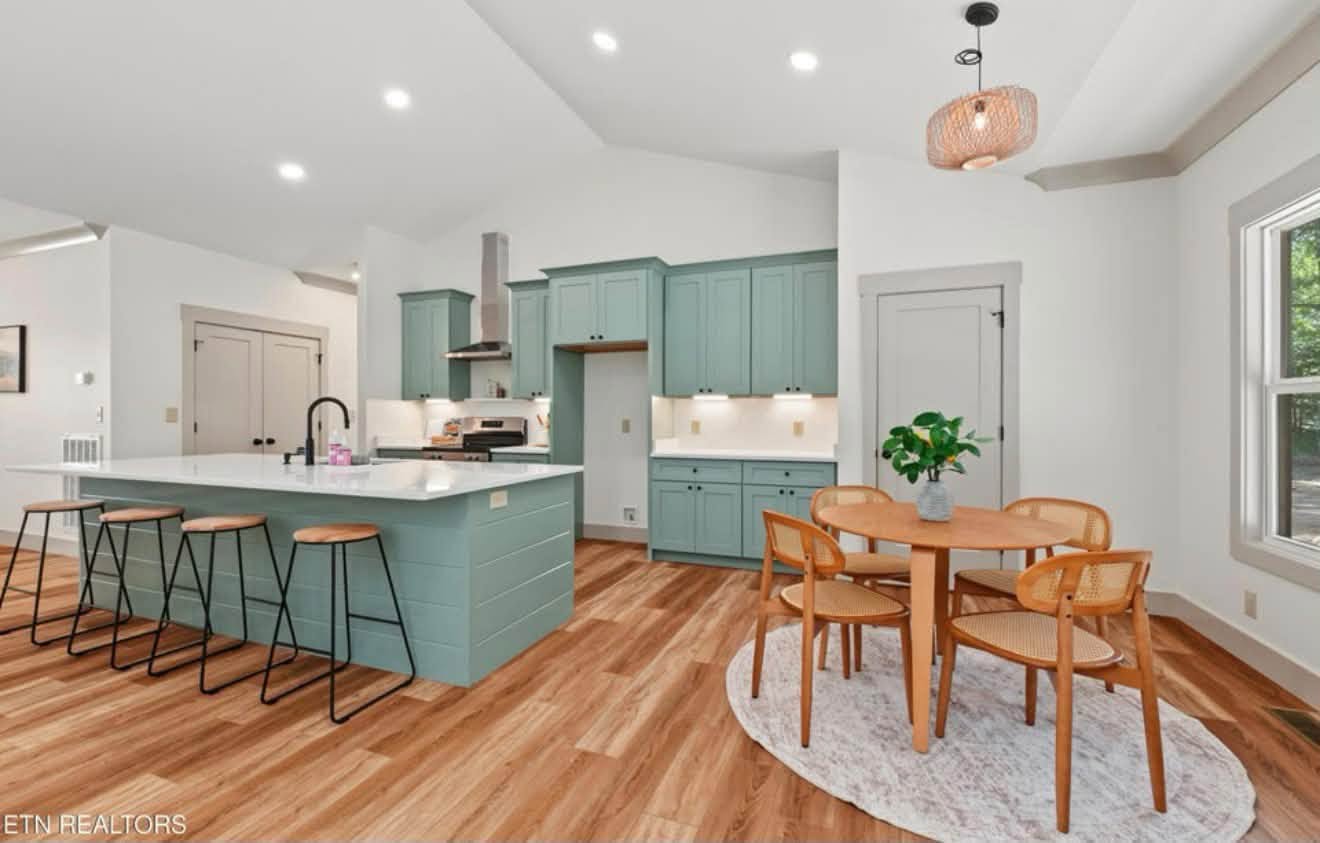 Staged kitchen and dining area
